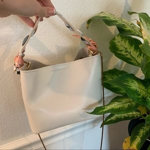 Creme bucket bag with twilly scarf